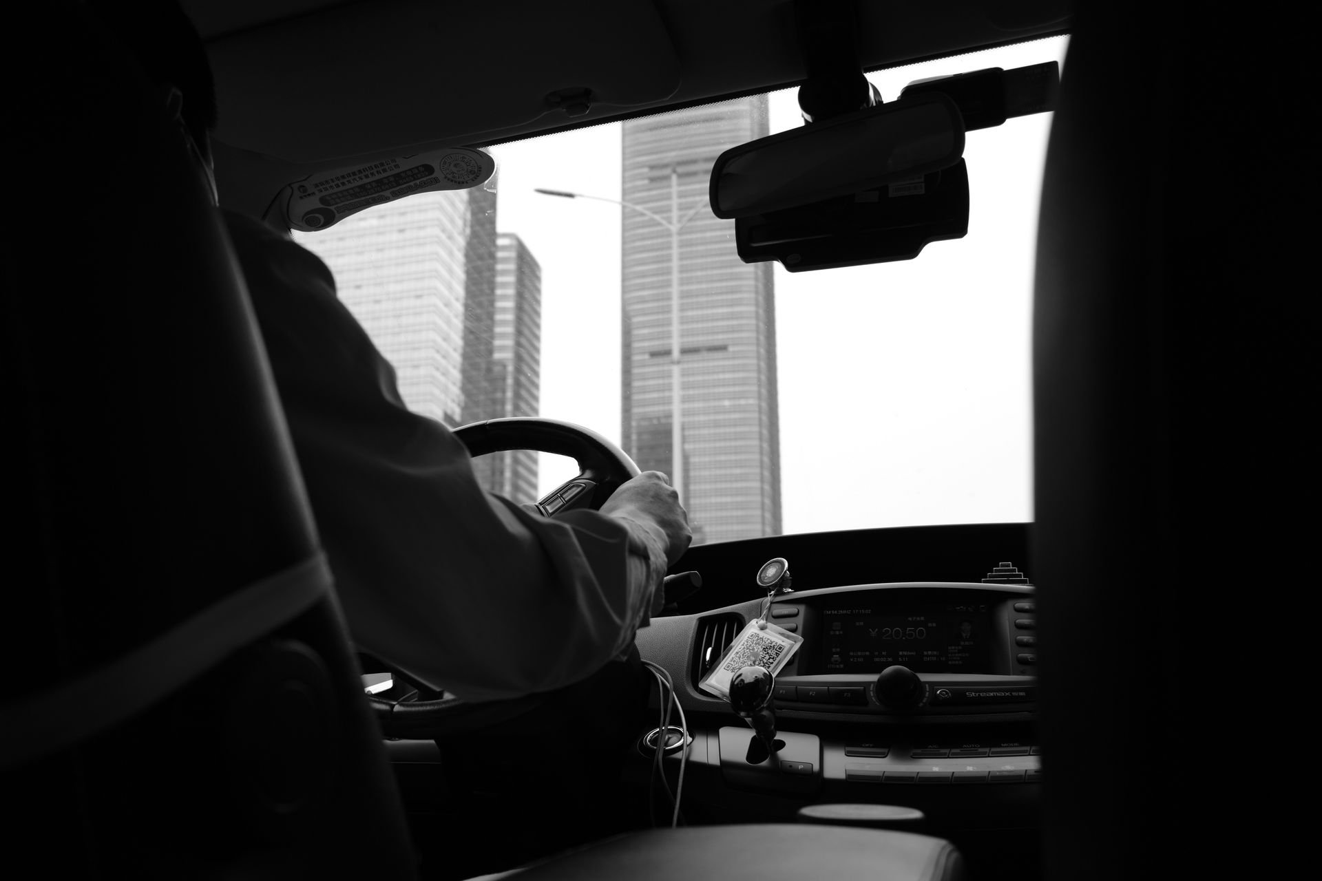 grayscale photo of car interior